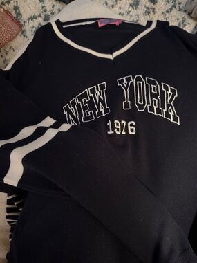 Edikted Black V-Neck Sweater with White Trim and 'New York 1976' Embroidery